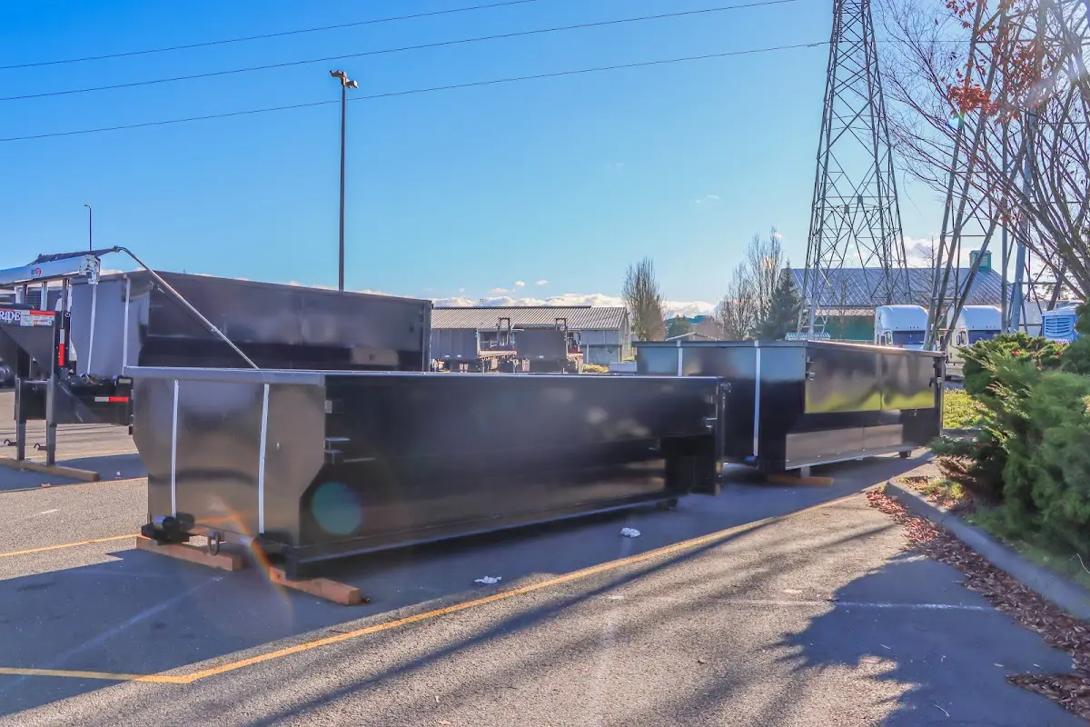 Roll-off dumpster ready for waste disposal at job site for Demolition Dumpster Rental in Madisonville